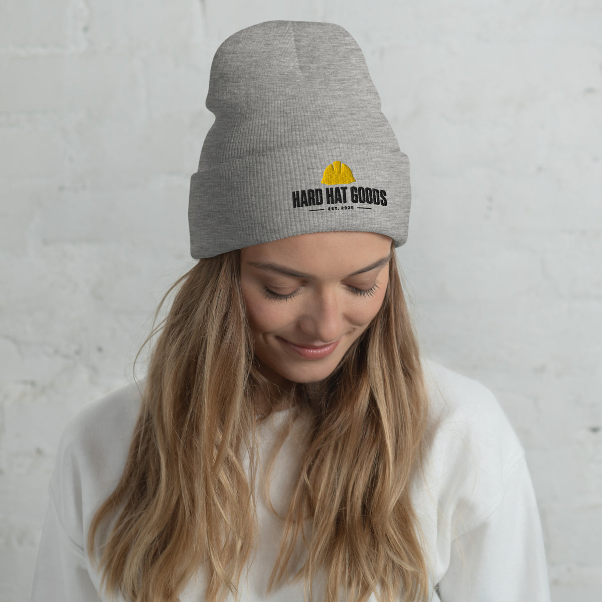 Black cuffed knit beanie with embroidered Hard Hat Goods logo